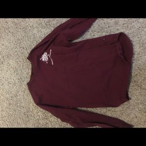 A maroon camp shirt